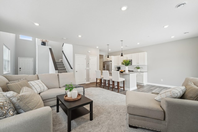 living room featuring light hardwood / wood-style floors