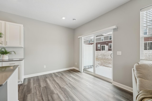 dining area with light hardwood / wood-style floors