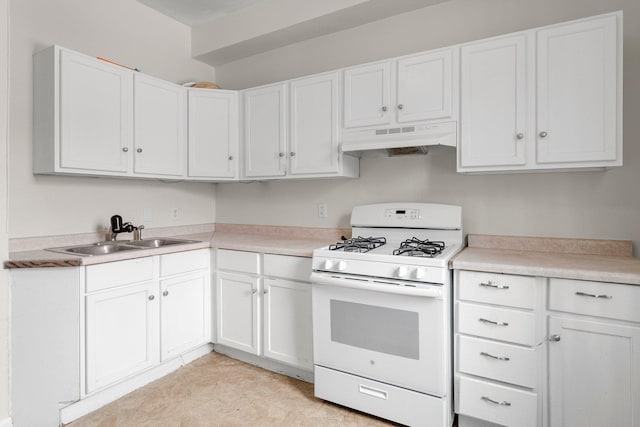 kitchen with white cabinetry, sink, and gas range gas stove