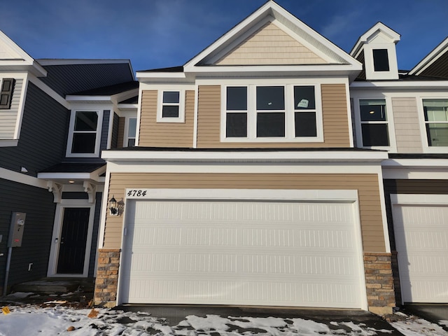 view of front of home with a garage