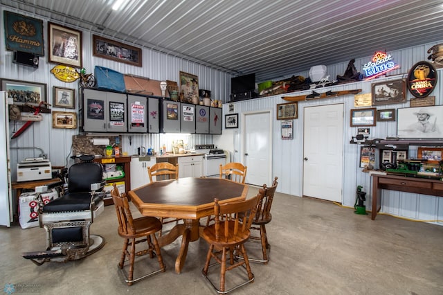 dining room with concrete floors