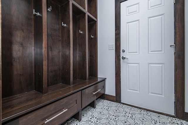 mudroom with light tile patterned floors