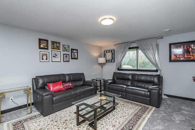 carpeted living room featuring a textured ceiling