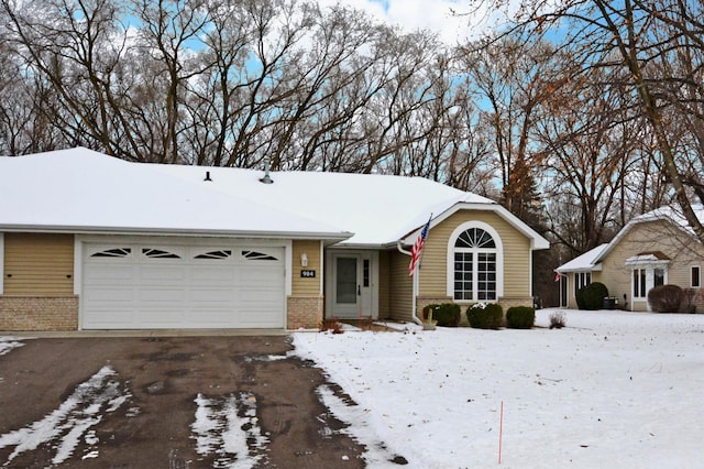 single story home with a garage