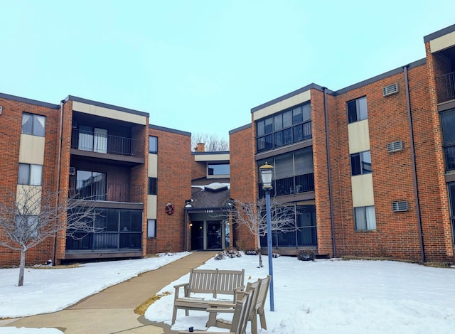 view of snow covered property