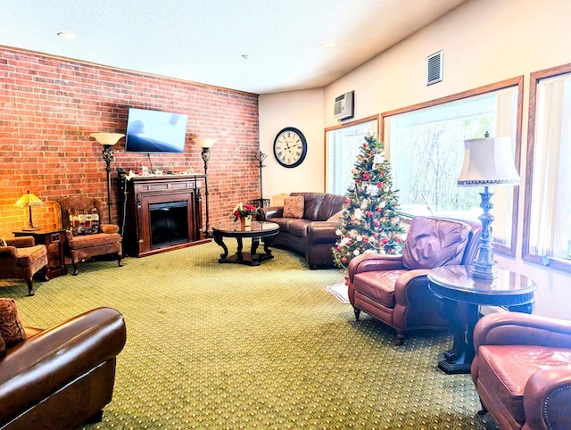 living room with carpet floors and brick wall