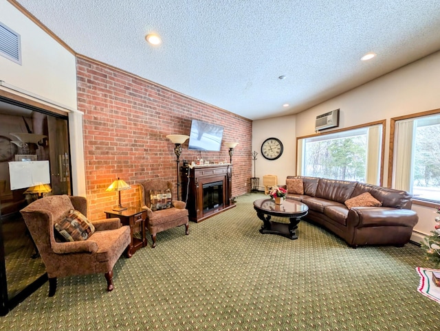 carpeted living room featuring a textured ceiling, recessed lighting, visible vents, an AC wall unit, and a glass covered fireplace