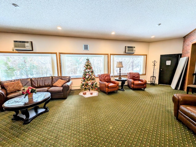 living room featuring a textured ceiling, a wall unit AC, carpet flooring, and visible vents