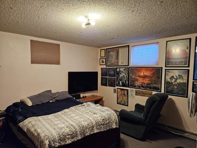 carpeted bedroom featuring a textured ceiling