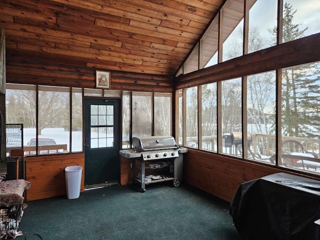 sunroom / solarium featuring wood ceiling and vaulted ceiling