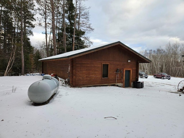 view of snow covered property