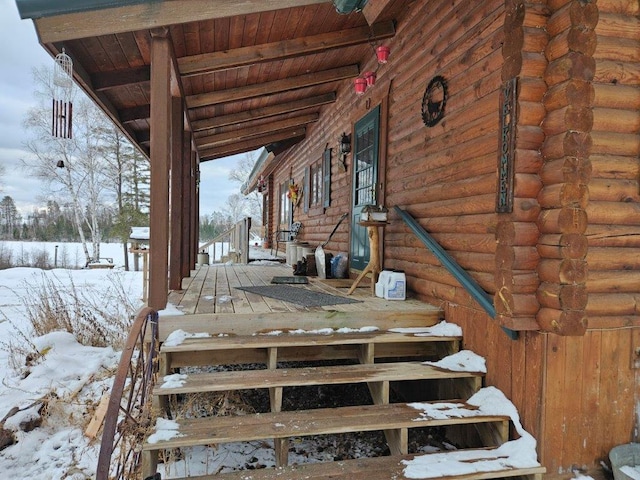 view of snow covered deck