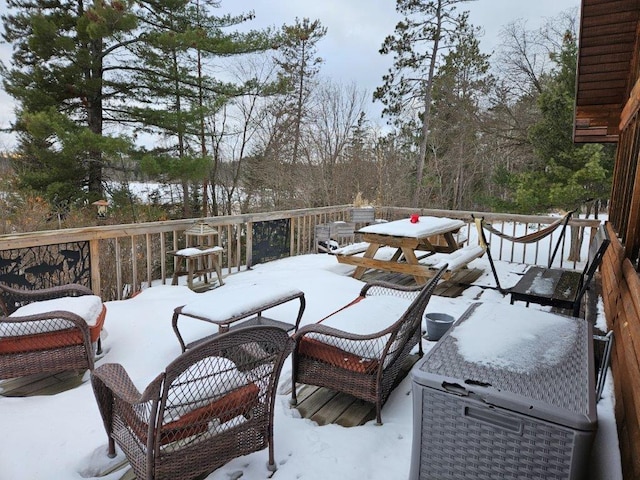 view of snow covered deck