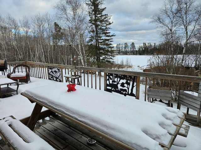 view of snow covered deck