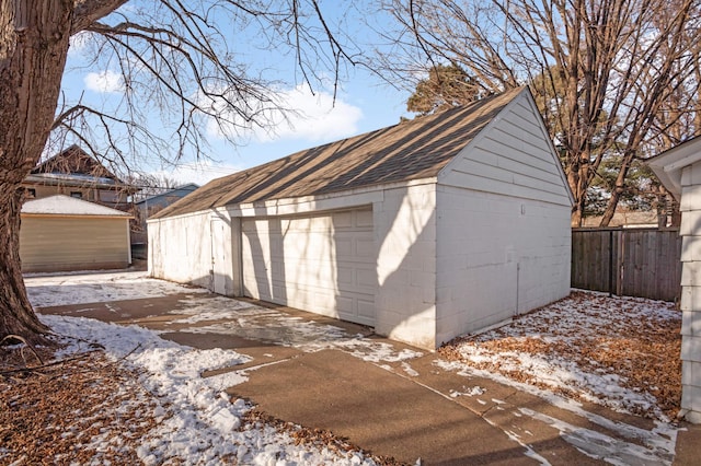 view of snow covered garage