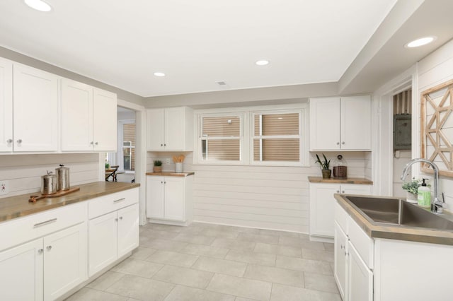 kitchen with sink and white cabinets