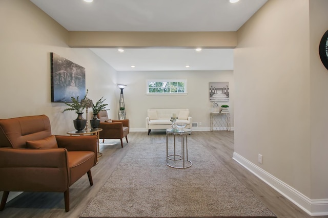 living area featuring hardwood / wood-style flooring