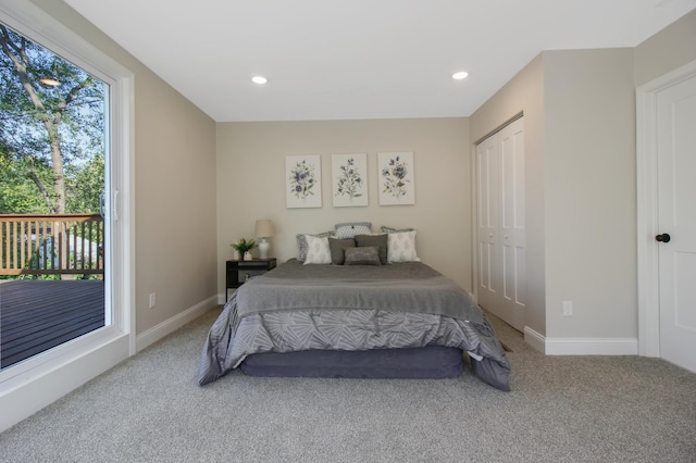 bedroom with carpet floors and a closet