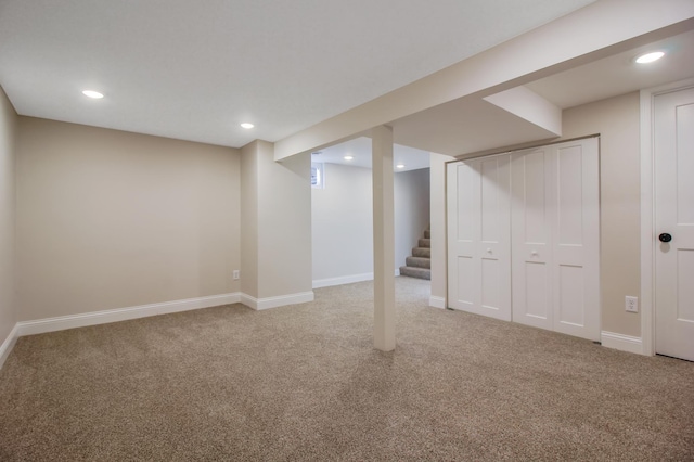 basement with carpet flooring