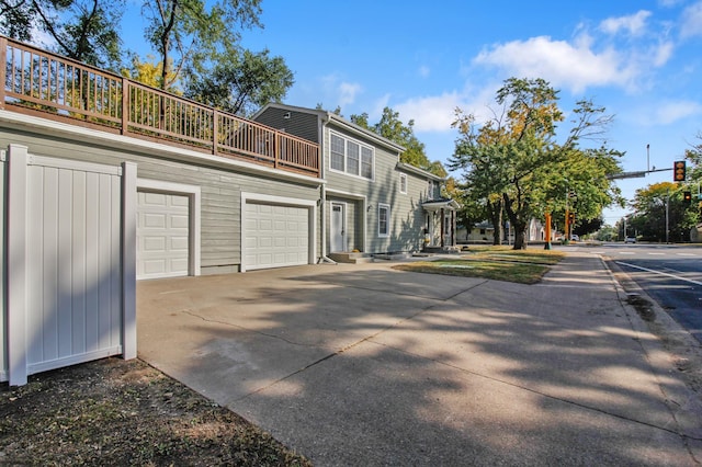 view of property exterior featuring a garage