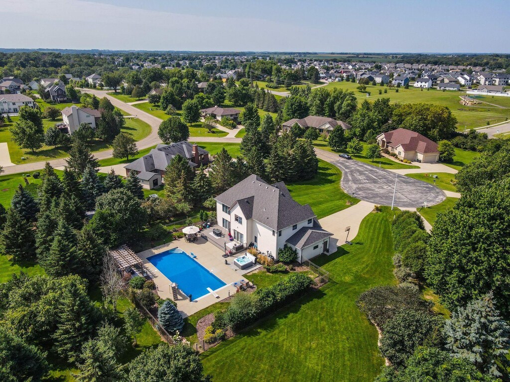 birds eye view of property with a residential view