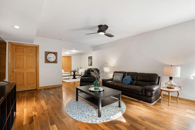 living room with recessed lighting, a ceiling fan, baseboards, and wood finished floors