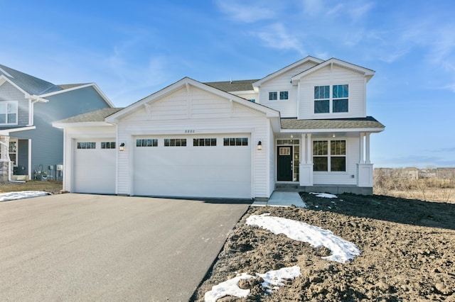 view of front of home with a garage