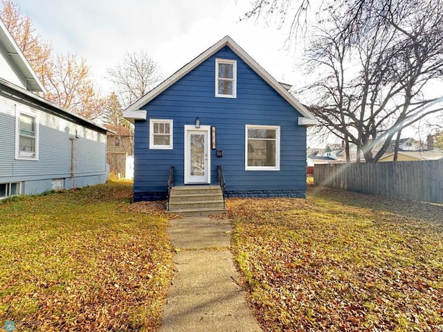 bungalow with a front lawn