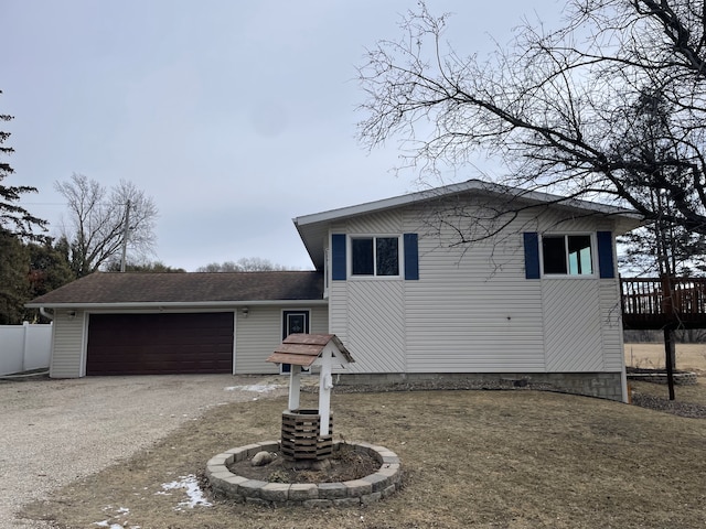 view of front of home with a garage