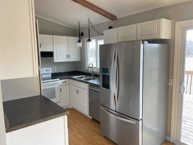 kitchen featuring sink, white cabinetry, appliances with stainless steel finishes, a healthy amount of sunlight, and light hardwood / wood-style floors