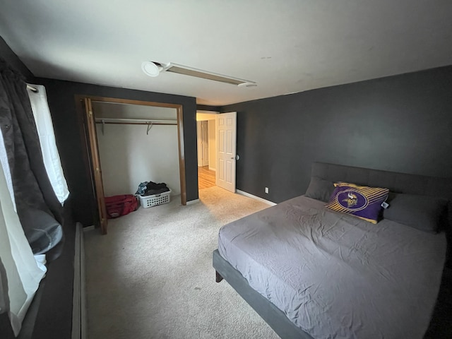 bedroom with a closet and carpet