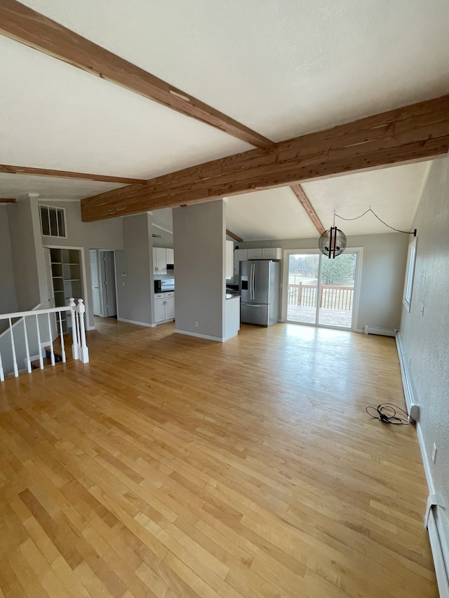 unfurnished living room featuring a baseboard radiator, beamed ceiling, and light wood-type flooring