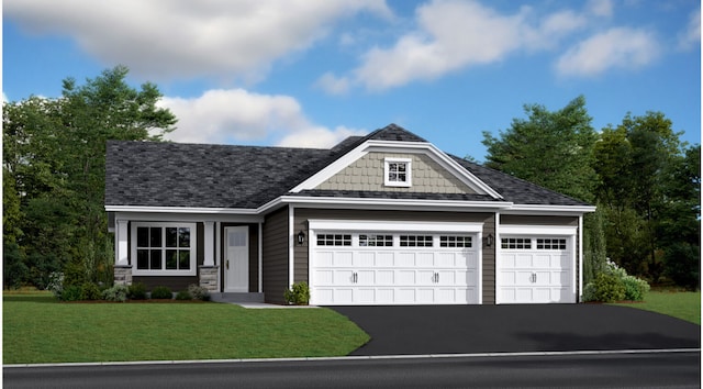 view of front facade with a garage and a front yard