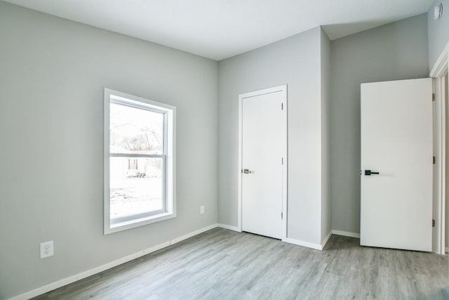 unfurnished bedroom featuring light hardwood / wood-style flooring