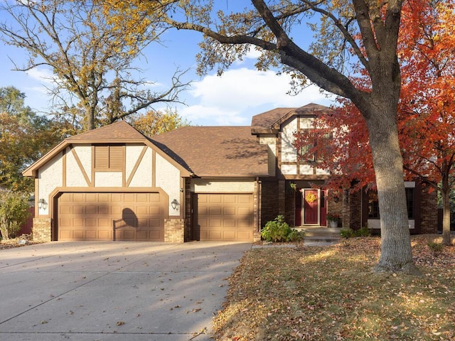 tudor home featuring a garage