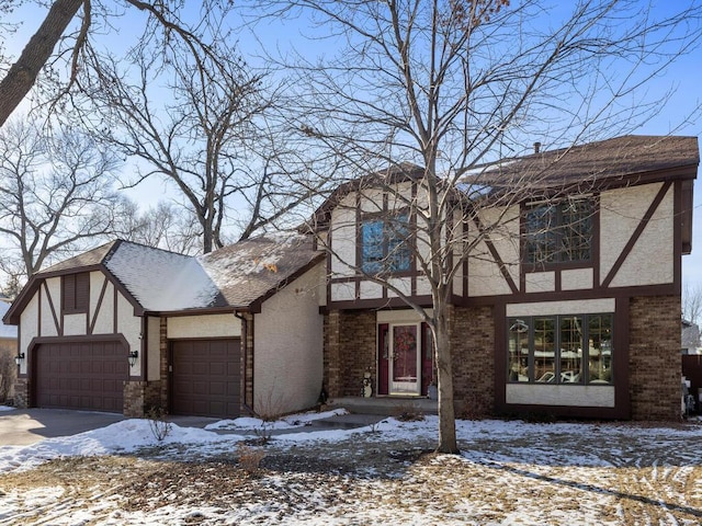 tudor home with a garage