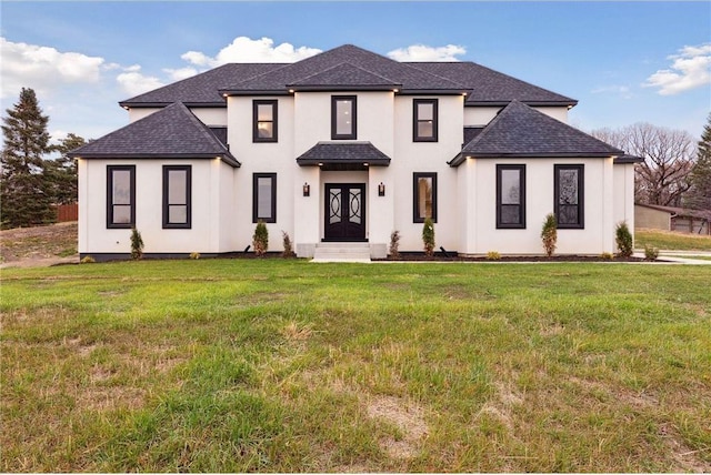 view of front of home with a front lawn