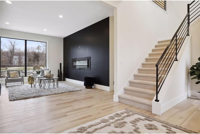 living room with light hardwood / wood-style flooring