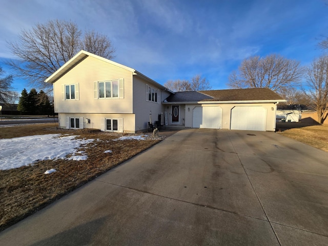 split level home featuring a garage