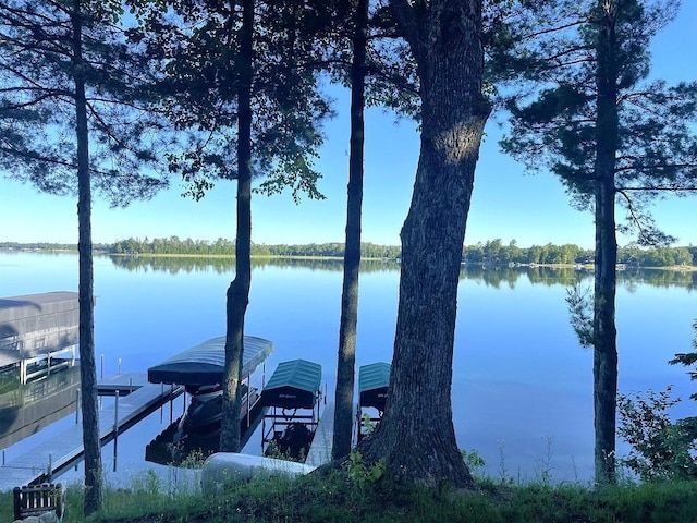 view of water feature with a boat dock