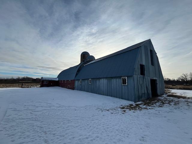 view of snow covered property