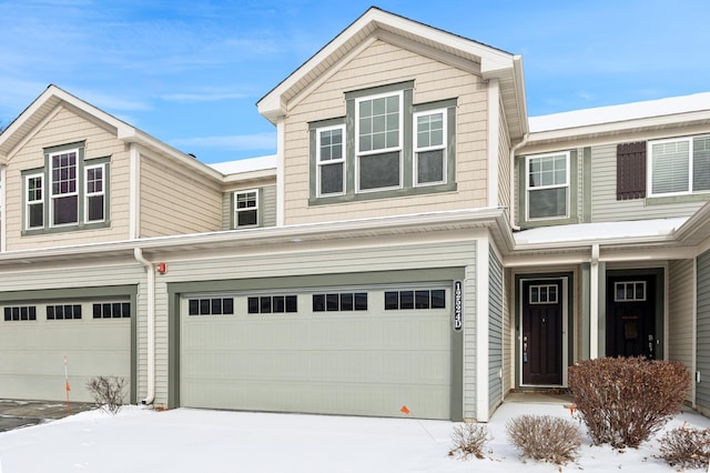 view of front of property featuring a garage