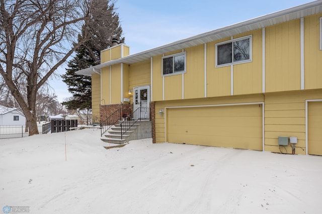 bi-level home with a garage