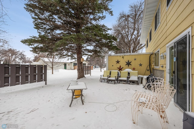 view of yard layered in snow