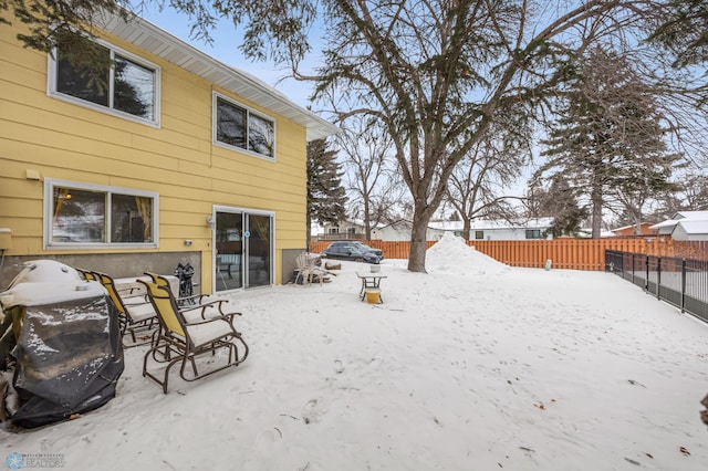 view of yard covered in snow