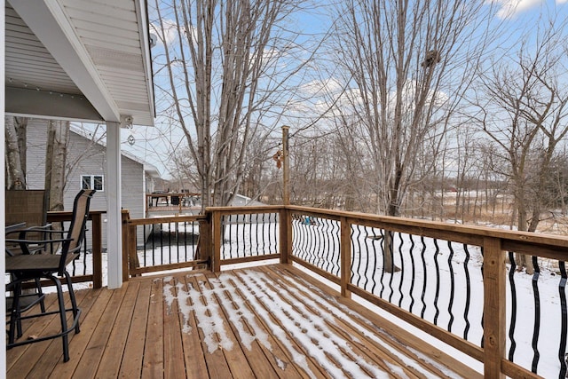 view of snow covered deck