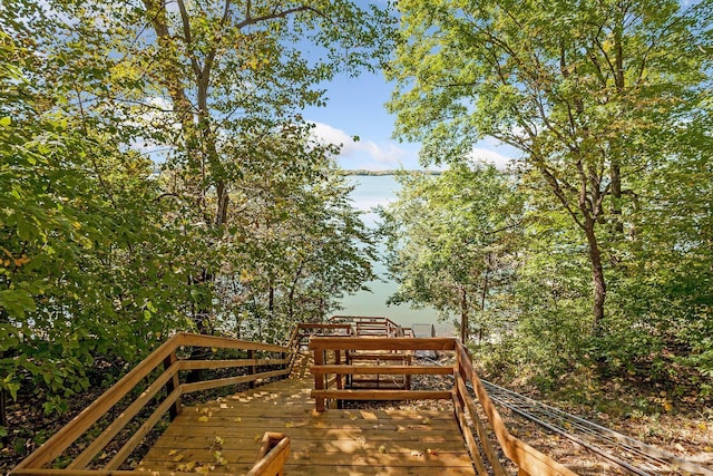 view of home's community featuring a wooden deck