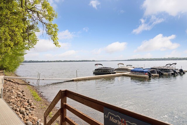 dock area with a water view