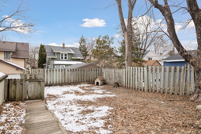 view of yard covered in snow