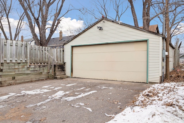 view of snow covered garage